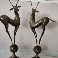 یک جفت گوزن برنجی قلم زنی