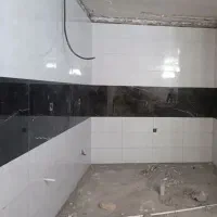 کاشیکار وبنای آجر بلوک دیوار چینی