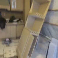 یک ویترین نبش کابینت همراه با سی آن سی فروش فوری