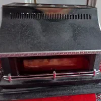 بخاری گازی طرح شومینه ای