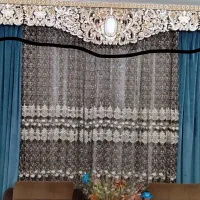 آرگ. کتیبه بالای پرده