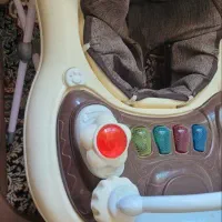 گهواره تاشو و روروک موزیکال