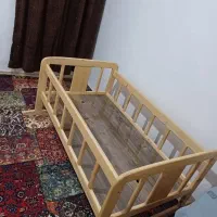 تخت چوبی نوزاد گهواره ای