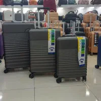 چمدان زیر قیمت خرید چهار چرخ دوبل برند کمل