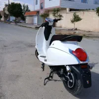 موتور برقی کویر|موتورسیکلت|کبودرآهنگ, |دیوار