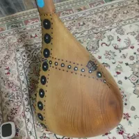 دمبوره ایبکی هزارگی ویا قتغنی|سازهای سنتی|قم, شهر قائم|دیوار