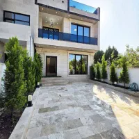 ویلادوبلکس  با حیاط سازی زیبا