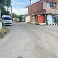 130متر-زمین-نیمه-ساخت-دارای-دو-دهنه-مغازه-12متری