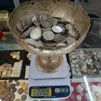 دو کیلو و دویست سکه نقره احمد شاه قاجار