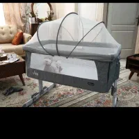 گهواره تخت کنار مادر