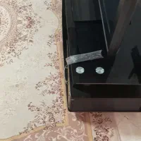 میز تلویزیون شیشه ای تمیز