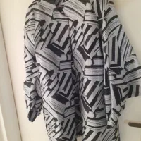 مانتو مجلسی|لباس|تهران, آسمان|دیوار