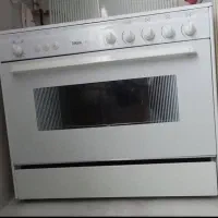 اجاق گاز فر دار و جوجه گردان