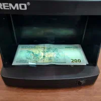 دستگاه تشخیص پول اصل و تقلبی