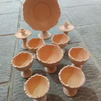 هفت سین و تعدادی سفال خام