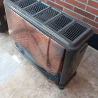 بخاری گازشهری بین مُبلی درحدّنو|بخاری، هیتر، شومینه|برازجان, |دیوار