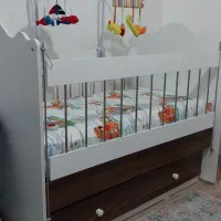 تخت گهواره ای با خوش خواب