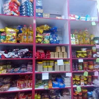 قفسه مغازه و شکلات و میز کار