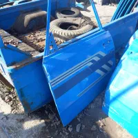 در و گلگیر و کاپوت و  اتاق جلو نیسان|قطعات یدکی و لوازم جانبی|رشت, لاکان|دیوار