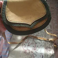کیف اولی چرمه طبیعی هست و استفاده نشده حتی یک بار