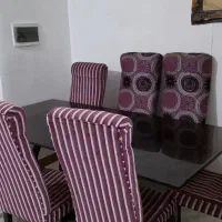 میز نهار خوری ۸ نفره با شیشه دودی