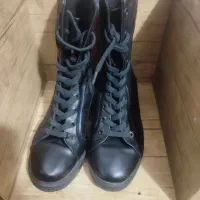 کفش پوتین|کیف، کفش، کمربند|قدس, شهر‌قدس|دیوار