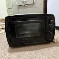 توستر کاملا نوعه نو سالم فقط چندبار استفاده شده