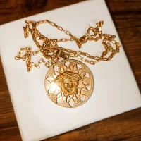 زنجیر پلاک ورساچه طلا 9گرم نیم 150بالا خام|جواهرات|نورآباد, |دیوار