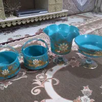 ظروف شیشه ای به رنگ فیروزه ای طرح دار