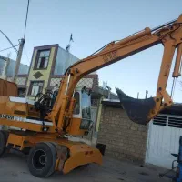 اجاره بیل مکانیکی چرخ لاستیکی 912