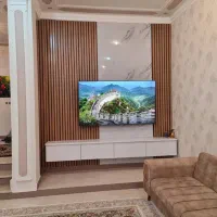 کاغذ دیواری هرمتر فقط ۸۰ت اجرای تی وی وال کفپوش