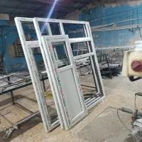 کارگاه درب پنجره همراه با شیشه های  دوجداره