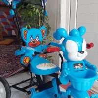 سه چرخ سایبان دار و فنر دار