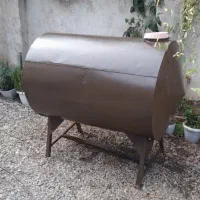 یک عدد تانکر فلزی ۱۲۰۰ لیتری