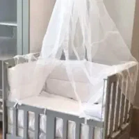 گهواره کنارتخته نوزاد نو