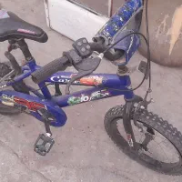 دوچرخه ۱۲ به همراه کمکی