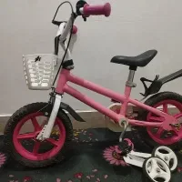 دوچرخه صورتی بچگانه