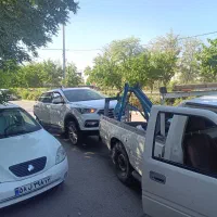 امداد خودرو یدک کش خودروبر باطری به باطری یدککش