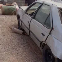 ماشین پژومدل برج12سال89سرپیچ چرخ زده عقبش ضربه دید