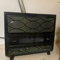 بخاری و ساعت قدی