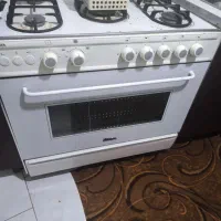اجاق گاز فر دار یخچال دو قلو