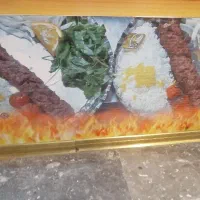 یک نفر کباب پز