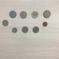 تعدادی سکه قدیمی ایرانی و خارجی