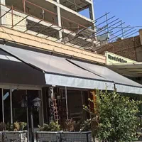 سایبان مغازه.فروشگاه سایبان پارکینگ بازویی متحرک