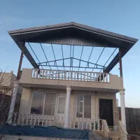 اجرای شیروانی خرپانمالمبه آلاچیق سردرب ایرانیت