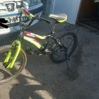 فروش دوچرخه ۲۰ سالم همه چی فابریک در حد نو