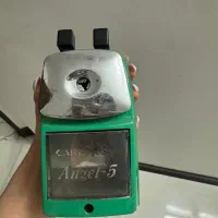 چراغ مطالعه و مداد تراش رو میزی ماشین حساب