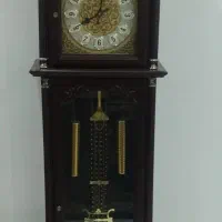 میز تلویزیون و ساعت ایستاده