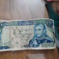 تعدادی سکه و اسکناس  شاهی و اروپایی و آسیایی