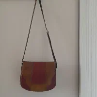 کیف چرم دوشی زنانه ۵۵۰تومن